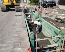 施工状況(4) 基礎砂利敷均/管渠工